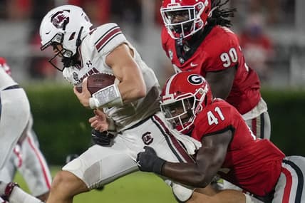 Sep 18, 2021; Athens, Georgia, USA; Georgia Bulldogs linebacker Channing Tindall (41) tackles South Carolina Gamecocks quarterback Luke Doty (4) during the second half at Sanford Stadium. Mandatory Credit: Dale Zanine-USA TODAY Sports