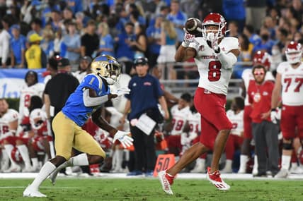 Sep 18, 2021; Pasadena, California, USA;  Fresno State Bulldogs wide receiver Ty Jones (8) makes a catch against UCLA Bruins defensive back Jay Shaw (1) in the second quarter at Rose Bowl. Mandatory Credit: Richard Mackson-USA TODAY Sports