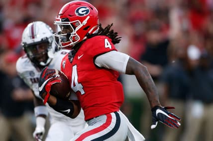 Georgia running back James Cook (4) drives in for a touchdown during the first half of an NCAA college football game between South Carolina and Georgia in Athens, Ga., on Sept. 18, 2021.

News Joshua L Jones