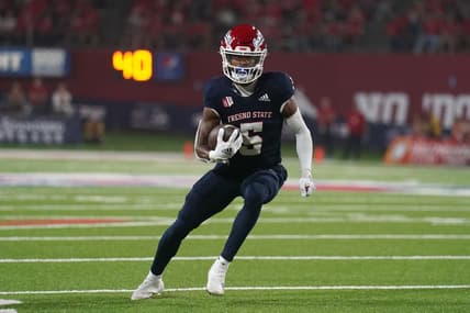 Sep 24, 2021; Fresno, California, USA; Fresno State Bulldogs wide receiver Jalen Cropper (5) runs the ball against the UNLV Rebels in the third quarter at Bulldog Stadium. Mandatory Credit: Cary Edmondson-USA TODAY Sports
