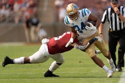Sep 25, 2021; Stanford, California, USA;  Stanford Cardinal linebacker Levani Damuni (3) tackles UCLA Bruins running back Zach Charbonnet (24) during the first quarter at Stanford Stadium. Mandatory Credit: Stan Szeto-USA TODAY Sports