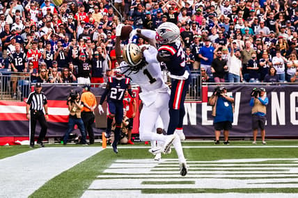Sep 26, 2021; Foxborough, Massachusetts, USA; New Orleans Saints wide receiver Marquez Callaway (1) catches a touchdown against New England Patriots defensive back Jonathan Jones (31) during the first half at Gillette Stadium. Mandatory Credit: Stephen Lew-USA TODAY Sports