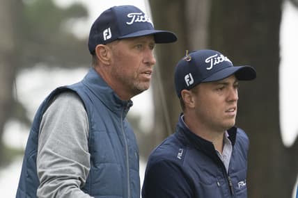 Aug 4, 2020; San Francisco, California, USA; Justin Thomas (right) talks to caddie Jim Mackay (left) on the 15th hole during a practice round of the PGA Championship golf tournament at TPC Harding Park. Mandatory Credit: Kyle Terada-USA TODAY Sports