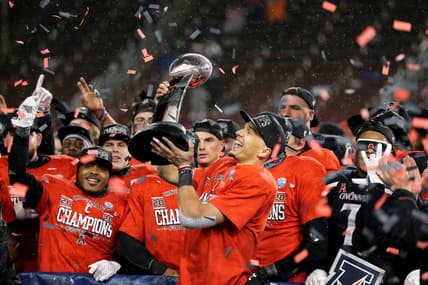 Cincinnati Bearcats quarterback Desmond Ridder (9) raises the championship trophy following the American Athletic Conference championship football game against the Tulsa Golden Hurricane, Saturday, Dec. 19, 2020, at Nippert Stadium in Cincinnati. The Cincinnati Bearcats won, 27-24.

Aac Championship Tulsa Golden Hurricane At Cincinnati Bearcats Football Dec 19