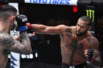 Mar 6, 2021; Las Vegas, NV, USA;  Thiago Santos of Brazil punches Aleksandar Rakic of Austria in their light heavyweight fight during the UFC 259 event at UFC APEX on March 06, 2021 in Las Vegas, Nevada. Mandatory Credit: Jeff Bottari/Handout Photo via USA TODAY Sports