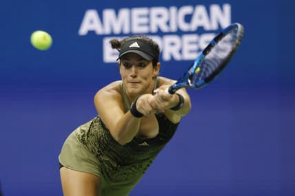 Sep 5, 2021; Flushing, NY, USA; Garbine Muguruza of Spain hits a backhand against Barbora Krejcikova of Czech Republic (not pictured) on day seven of the 2021 U.S. Open tennis tournament at USTA Billie Jean King National Tennis Center. Mandatory Credit: Geoff Burke-USA TODAY Sports
