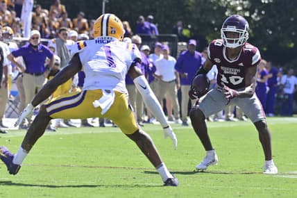 Sep 25, 2021; Starkville, Mississippi, USA; Mississippi State Bulldogs wide receiver Makai Polk (10) runs the ball while defended by LSU Tigers cornerback Eli Ricks (1) during the fourth quarter at Davis Wade Stadium at Scott Field. Mandatory Credit: Matt Bush-USA TODAY Sports