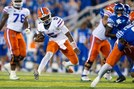 Oct 2, 2021; Lexington, Kentucky, USA; Florida Gators quarterback Emory Jones (5) runs the ball against the Kentucky Wildcats during the fourth quarter at Kroger Field. Mandatory Credit: Jordan Prather-USA TODAY Sports