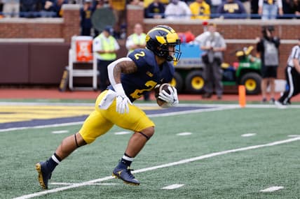 Sep 25, 2021; Ann Arbor, Michigan, USA;  Michigan Wolverines running back Blake Corum (2) runs the ball against the Rutgers Scarlet Knights at Michigan Stadium. Mandatory Credit: Rick Osentoski-USA TODAY Sports