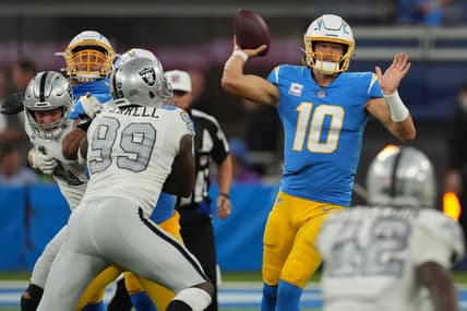 Oct 4, 2021; Inglewood, California, USA; Los Angeles Chargers quarterback Justin Herbert (10) throws a pass against the Las Vegas Raiders during the first half at SoFi Stadium. Mandatory Credit: Kirby Lee-USA TODAY Sports