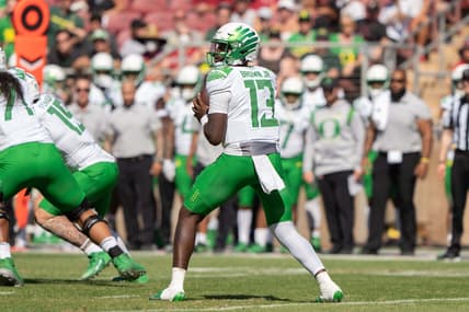 Oct 2, 2021; Stanford, California, USA;  Oregon Ducks quarterback Anthony Brown (13) prepares to throw the football during the second quarter against the Stanford Cardinal at Stanford Stadium. Mandatory Credit: Stan Szeto-USA TODAY Sports