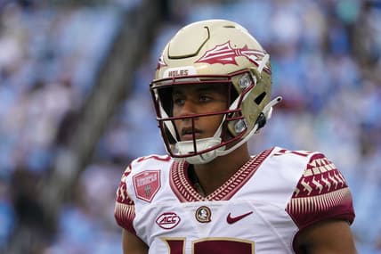 Oct 9, 2021; Chapel Hill, North Carolina, USA;  Florida State Seminoles quarterback Jordan Travis (13) looks on from the sidelines against the North Carolina Tar Heels at Kenan Memorial Stadium. Mandatory Credit: James Guillory-USA TODAY Sports
