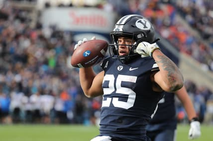 Oct 9, 2021; Provo, Utah, USA; Brigham Young Cougars running back Tyler Allgeier (25) reacts to scoring a touchdown in the fourth quarter at LaVell Edwards Stadium. Mandatory Credit: Rob Gray-USA TODAY Sports