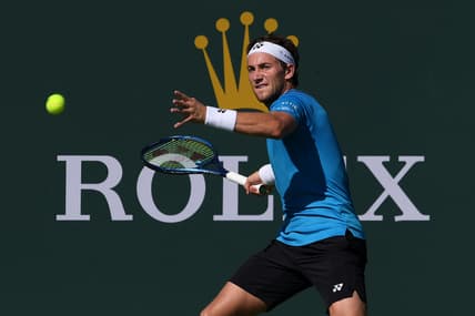 Oct 9, 2021; Indian Wells, CA, USA; Casper Ruud (NOR) hits a shot against Roberto Carballes Baena (ESP) at Indian Wells Tennis Garden. Mandatory Credit: Orlando Ramirez-USA TODAY Sports