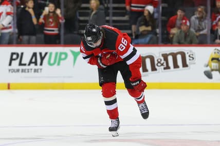 Oct 19, 2021; Newark, New Jersey, USA; New Jersey Devils center Jack Hughes (86) skates off the ice after being hit during the first period of their game against the Seattle Kraken at Prudential Center. Mandatory Credit: Ed Mulholland-USA TODAY Sports