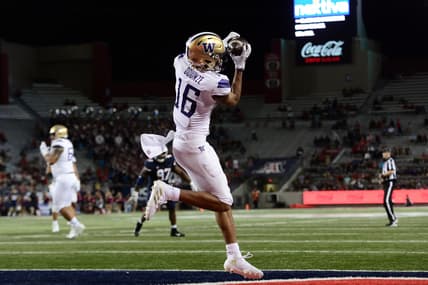 Oct 22, 2021; Tucson, Arizona, USA; Washington Huskies wide receiver Rome Odunze (16) catches a touchdown pass against the Arizona Wildcats during the second half at Arizona Stadium. Mandatory Credit: Joe Camporeale-USA TODAY Sports