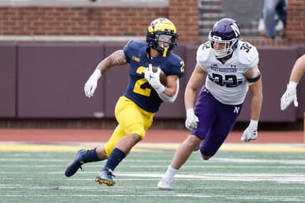 Oct 23, 2021; Ann Arbor, Michigan, USA;  Michigan Wolverines running back Blake Corum (2) rushes in the first half against the Northwestern Wildcats at Michigan Stadium. Mandatory Credit: Rick Osentoski-USA TODAY Sports