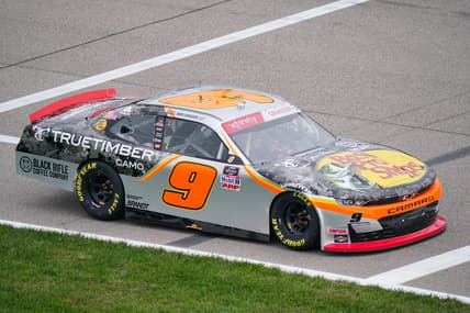 Oct 23, 2021; Kansas City, MO, USA; NASCAR Xfinity Series driver Noah Gragson (9) pulls out of pit lane at the start of the Kansas Lottery 300 at Kansas Speedway. Mandatory Credit: Denny Medley-USA TODAY Sports