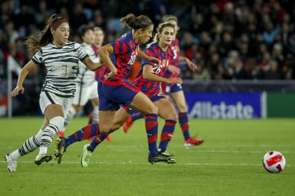 Oct 26, 2021; St. Paul, Minnesota, USA; United States forward Carli Lloyd (10) dribbles past South Korea defender Jeong Yeonga (3) in the first half of an international friendly soccer match at Allianz Field. Mandatory Credit: Bruce Kluckhohn-USA TODAY Sports