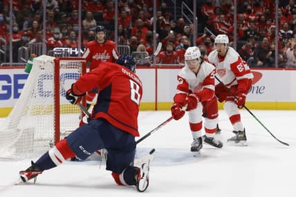 Oct 27, 2021; Washington, District of Columbia, USA; Washington Capitals left wing Alex Ovechkin (8) scores a goal on Detroit Red Wings goaltender Thomas Greiss (29) during the first period at Capital One Arena. Mandatory Credit: Geoff Burke-USA TODAY Sports