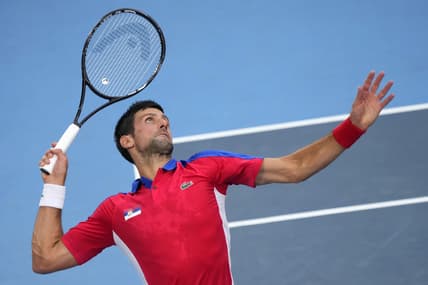 Jul 30, 2021; Tokyo, Japan; Novak Djokovic (SRB) serves against Alexander Zverev (GER) in the men's singles semifinals during the Tokyo 2020 Olympic Summer Games at Ariake Tennis Park. Mandatory Credit: Robert Deutsch-USA TODAY Sports
