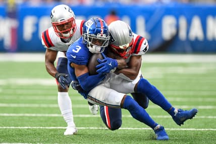 Aug 29, 2021; East Rutherford, New Jersey, USA; New England Patriots cornerback Mike Jackson (35) makes a tackles on New York Giants wide receiver Sterling Shepard (3) during the second quarte at MetLife Stadium. Mandatory Credit: Dennis Schneidler-USA TODAY Sports