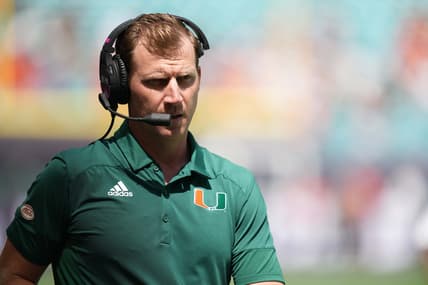 Sep 18, 2021; Miami Gardens, Florida, USA; Miami Hurricanes offensive coordinator Rhett Lashlee walks on the sidelines prior to the game against the Michigan State Spartans at Hard Rock Stadium. Mandatory Credit: Jasen Vinlove-USA TODAY Sports
