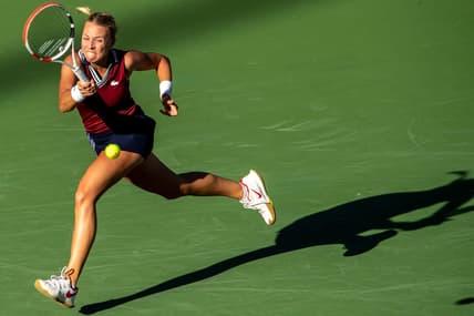 Anett Kontaveit of Estonia returns a shot to Ons Jabeur of Tunisia during their quarterfinal match at the BNP Paribas Open in Indian Wells, Calif., on October 14, 2021.

Ons Jabeur Def Anett Kontaveit Bnp Paribas2145