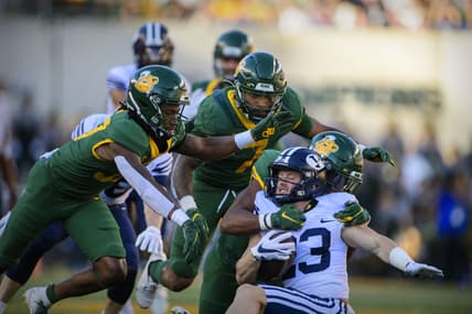 Oct 16, 2021; Waco, Texas, USA; Brigham Young Cougars wide receiver Hobbs Nyberg (23) is brought down by the Baylor Bears defense during the second half at McLane Stadium. Mandatory Credit: Jerome Miron-USA TODAY Sports