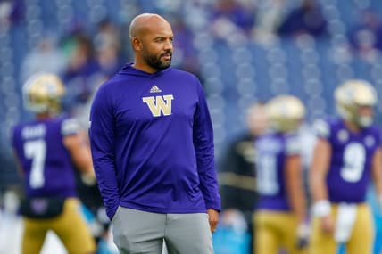 Oct 16, 2021; Seattle, Washington, USA; Washington Huskies head coach Jimmy Lake watches pregame warmups against the UCLA Bruins at Alaska Airlines Field at Husky Stadium. Mandatory Credit: Joe Nicholson-USA TODAY Sports