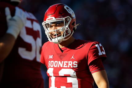 OU quarterback Caleb Williams (13) smiles after throwing a touchdown pass during a 52-21 win against Texas Tech on Saturday at Gaylord Family-Oklahoma Memorial Stadium in Norman.cover main