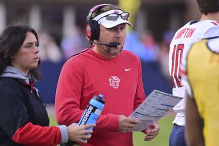 Nov 6, 2021; Oxford, Mississippi, USA; Liberty Flames head coach Hugh Freeze walks down the sideline during the first quarter against the Mississippi Rebels at Vaught-Hemingway Stadium. Mandatory Credit: Matt Bush-USA TODAY Sports