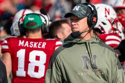 Nov 6, 2021; Lincoln, Nebraska, USA; Nebraska Cornhuskers head coach Scott Frost (right) looks onto the field during the second quarter against the Ohio State Buckeyes at Memorial Stadium. Mandatory Credit: Dylan Widger-USA TODAY Sports