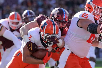 Nov 6, 2021; Minneapolis, Minnesota, USA; Illinois Fighting Illini running back Chase Brown (2) runs the ball against the Minnesota Golden Gophers in the second quarter at Huntington Bank Stadium. Mandatory Credit: Matt Krohn-USA TODAY Sports