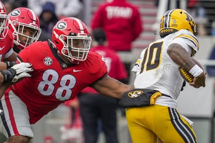 Nov 6, 2021; Athens, Georgia, USA; Georgia Bulldogs defensive lineman Jalen Carter (88) tackles Missouri Tigers quarterback Tyler Macon (10) during the first half at Sanford Stadium. Mandatory Credit: Dale Zanine-USA TODAY Sports