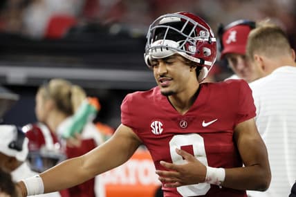 Nov 6, 2021; Tuscaloosa, Alabama, USA; Alabama Crimson Tide quarterback Bryce Young (9) talks with players along the sidelines during the first half against the LSU Tigers at Bryant-Denny Stadium. Mandatory Credit: Butch Dill-USA TODAY Sports