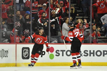 Nov 9, 2021; Newark, New Jersey, USA; New Jersey Devils left wing Andreas Johnsson (11) reacts after scoring a goal against the Florida Panthers during the first period at Prudential Center. Mandatory Credit: Catalina Fragoso-USA TODAY Sports
