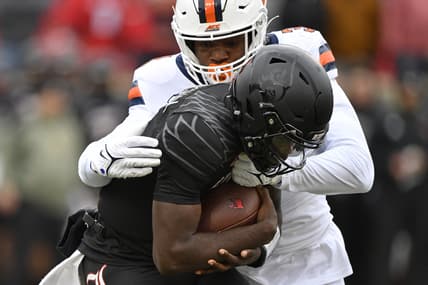 Nov 13, 2021; Louisville, Kentucky, USA; Syracuse Orange linebacker Mikel Jones (3) tackles Louisville Cardinals quarterback Malik Cunningham (3) during the first quarter at Cardinal Stadium. Mandatory Credit: Jamie Rhodes-USA TODAY Sports