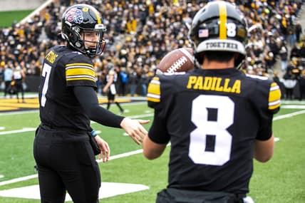 Iowa quarterback Spencer Petras (7) tosses a ball to teammate Alex Padilla (8) as they warm up before a NCAA Big Ten Conference football game against Minnesota, Saturday, Nov. 13, 2021, at Kinnick Stadium in Iowa City, Iowa.
211113 Minn Iowa Fb 097 Jpg