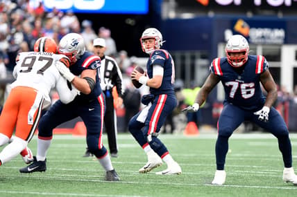 Nov 14, 2021; Foxborough, Massachusetts, USA; New England Patriots quarterback Mac Jones (10) looks to throw against the Cleveland Browns during the first half at Gillette Stadium. Mandatory Credit: Brian Fluharty-USA TODAY Sports