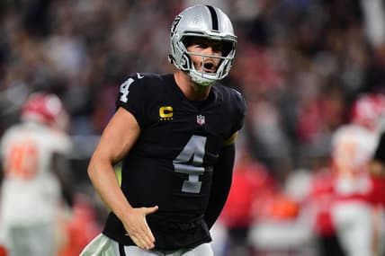 Nov 14, 2021; Paradise, Nevada, USA; Las Vegas Raiders quarterback Derek Carr (4) celebrates the touchdown scored by wide receiver Bryan Edwards (89) during the second half at Allegiant Stadium. Mandatory Credit: Gary A. Vasquez-USA TODAY Sports