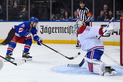 Nov 16, 2021; New York, New York, USA; New York Rangers left wing Chris Kreider (20) shots the puck and scores against Montreal Canadiens goaltender Cayden Primeau (30) during the second period at Madison Square Garden. Mandatory Credit: Dennis Schneidler-USA TODAY Sports