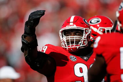 Georgia defensive lineman Jordan Davis (99) celebrates after getting his first career touchdown during the first half of a NCAA college football game between Charleston Southern and Georgia in Athens, Ga., on Saturday, Nov. 20, 2021. Georgia won 56-7.

News Joshua L Jones