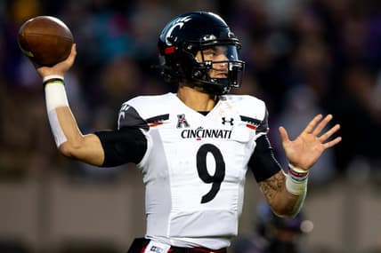 Cincinnati Bearcats quarterback Desmond Ridder (9) throws a pass in the first half of the NCAA football game between the Cincinnati Bearcats and the East Carolina Pirates at Dowdy-Ficklen Stadium in Greenville, NC, on Friday, Nov. 26, 2021.

Cincinnati Bearcats At East Carolina Pirates 20