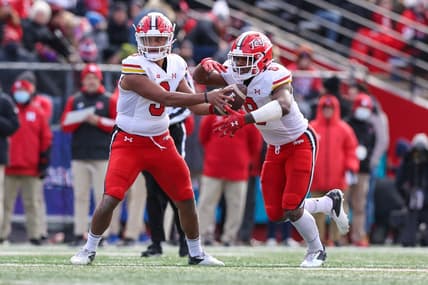 Nov 27, 2021; Piscataway, New Jersey, USA; Maryland Terrapins quarterback Taulia Tagovailoa (3) hands off to running back Tayon Fleet-Davis (8) against the Rutgers Scarlet Knights during the first half at SHI Stadium. Mandatory Credit: Vincent Carchietta-USA TODAY Sports