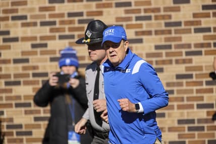 Nov 27, 2021; Durham, North Carolina, USA;  Duke Blue Devils head coach David Cutcliffe runs out during the first half of the game against the Miami Hurricanes at Wallace Wade Stadium. at Wallace Wade Stadium. Mandatory Credit: Jaylynn Nash-USA TODAY Sports