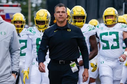 Nov 6, 2021; Seattle, Washington, USA; Oregon Ducks head coach Mario Cristobal walks with his players from the locker room before a game against the Washington Huskies at Alaska Airlines Field at Husky Stadium. Mandatory Credit: Joe Nicholson-USA TODAY Sports