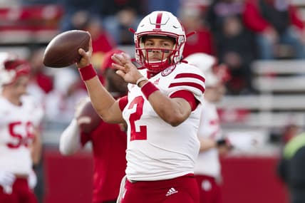 Nov 20, 2021; Madison, Wisconsin, USA;  Nebraska Cornhuskers quarterback Adrian Martinez (2) throws a pass during warmups prior to the game against the Wisconsin Badgers at Camp Randall Stadium. Mandatory Credit: Jeff Hanisch-USA TODAY Sports