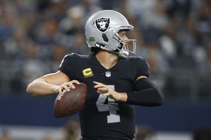 Nov 25, 2021; Arlington, Texas, USA; Las Vegas Raiders quarterback Derek Carr (4) throws a pass in the second quarter against the Dallas Cowboys at AT&T Stadium. Mandatory Credit: Tim Heitman-USA TODAY Sports