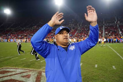 Nov 27, 2021; Los Angeles, California, USA; BYU Cougars head coach Kalani Sitake celebrates in the second half against the Southern California Trojans at United Airlines Field at Los Angeles Memorial Coliseum. Mandatory Credit: Kirby Lee-USA TODAY Sports